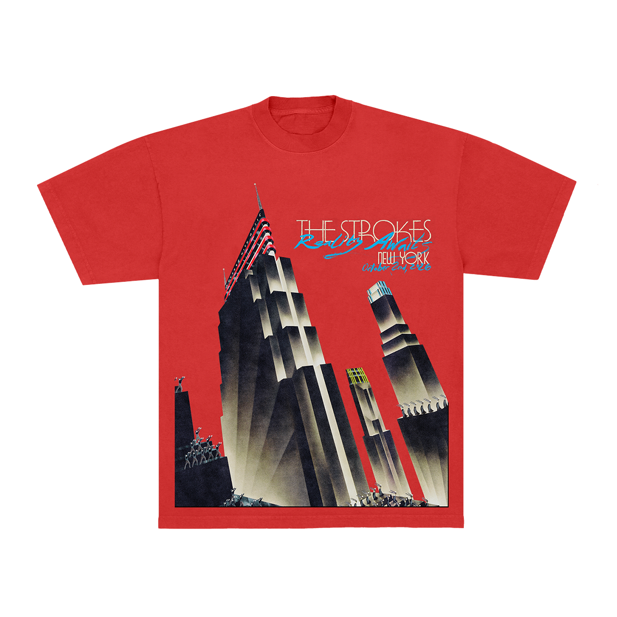 A red short-sleeve graphic t-shirt featuring a stylized art deco illustration of the New York City skyline, with 'THE STROKES' and 'NEW YORK' printed across the chest.