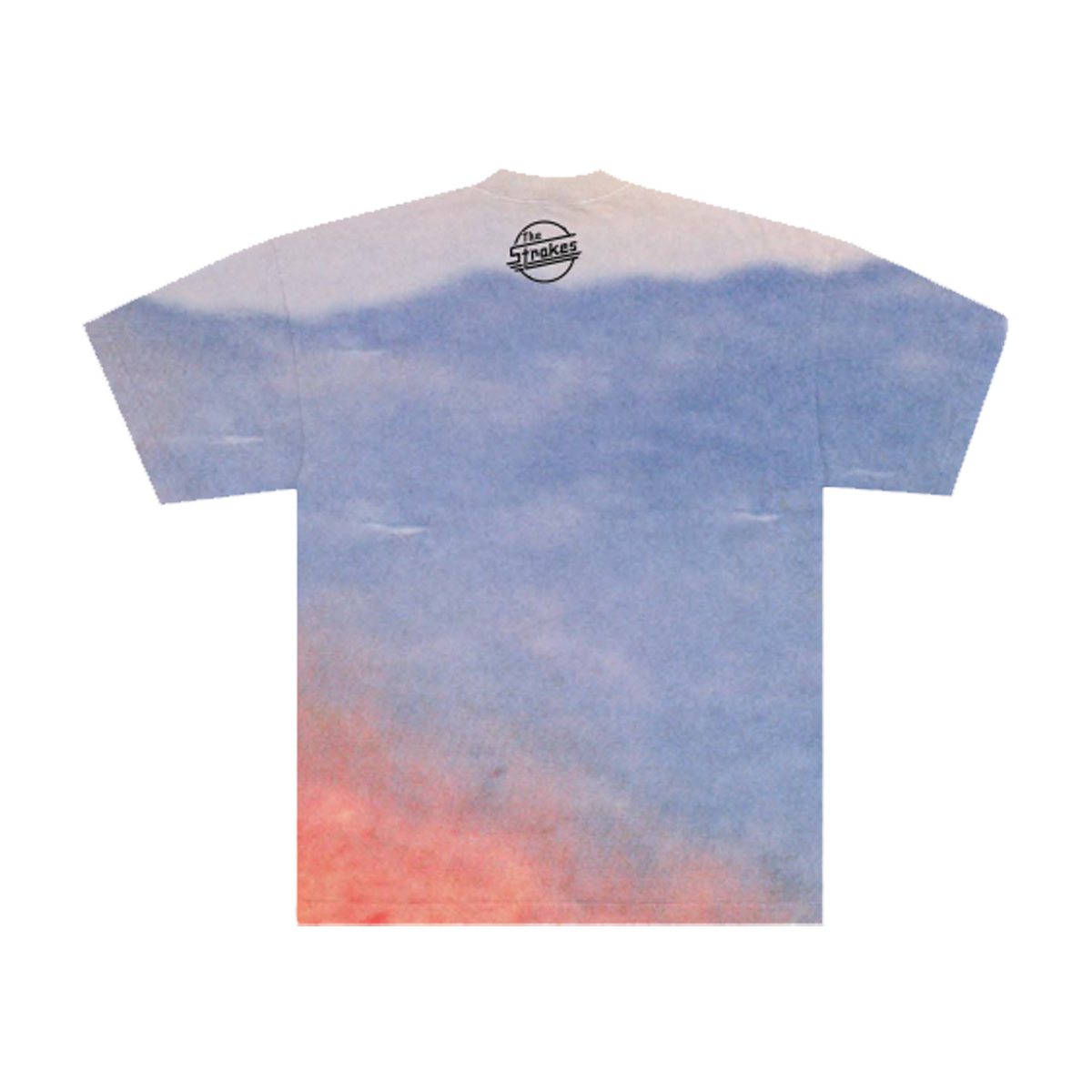 Back of a T-shirt with a mountain range background and a black "The Strokes". symbol underneath the neck collar. 