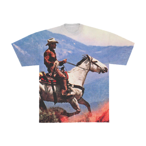 Front of a T-shirt with Cowboy on a horse with a mountainous background 