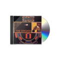 The CD, CD case and cover for The Strokes' album Room on Fire The cover features an oil painting artwork dominated by textured brushstrokes in shades of gold, black, red, and cream, depicting a stylized figure and abstract forms. The band's name, "THE STROKES" and the album title, "room on fire," are written in a small, elegant cursive script in the upper-right corner, maintaining the album's signature classic art aesthetic.