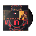 The vinyl LP packaging for The Strokes' album Room on Fire The cover features an oil painting artwork dominated by textured brushstrokes in shades of gold, black, red, and cream, depicting a stylized figure and abstract forms. The band's name, "THE STROKES" and the album title, "room on fire," are written in a small, elegant cursive script in the upper-right corner, maintaining the album's signature classic art aesthetic.