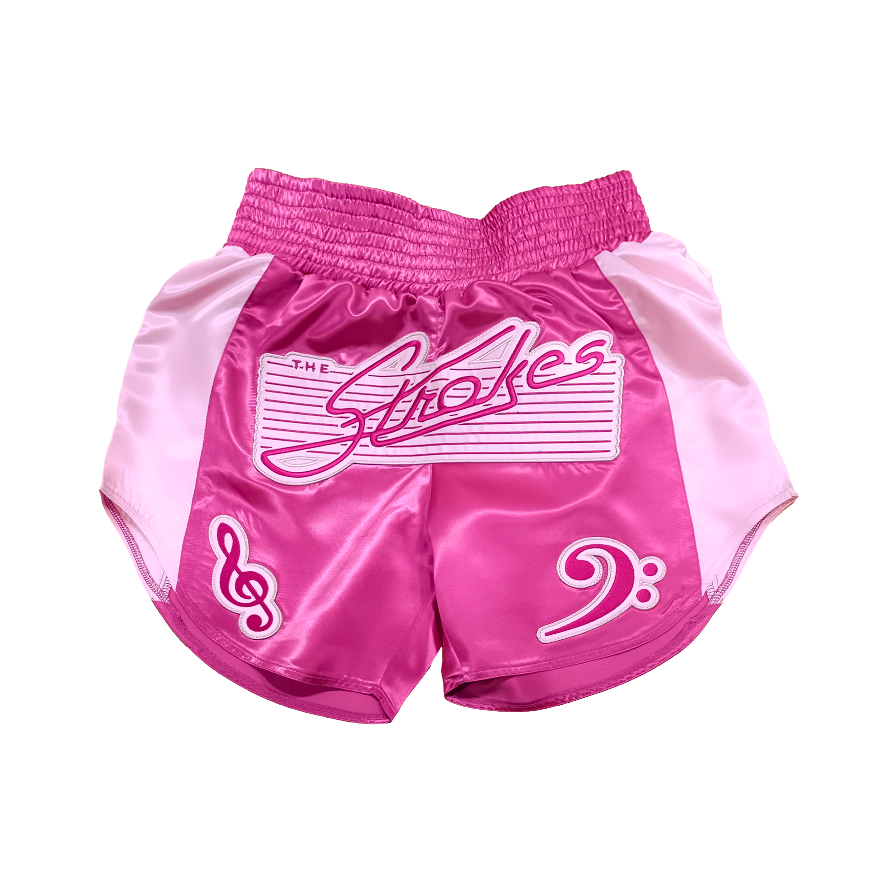 A pair of pink Muay Thai shorts with lighter pink graphics, including a logo on a notes sheet and musical notes.